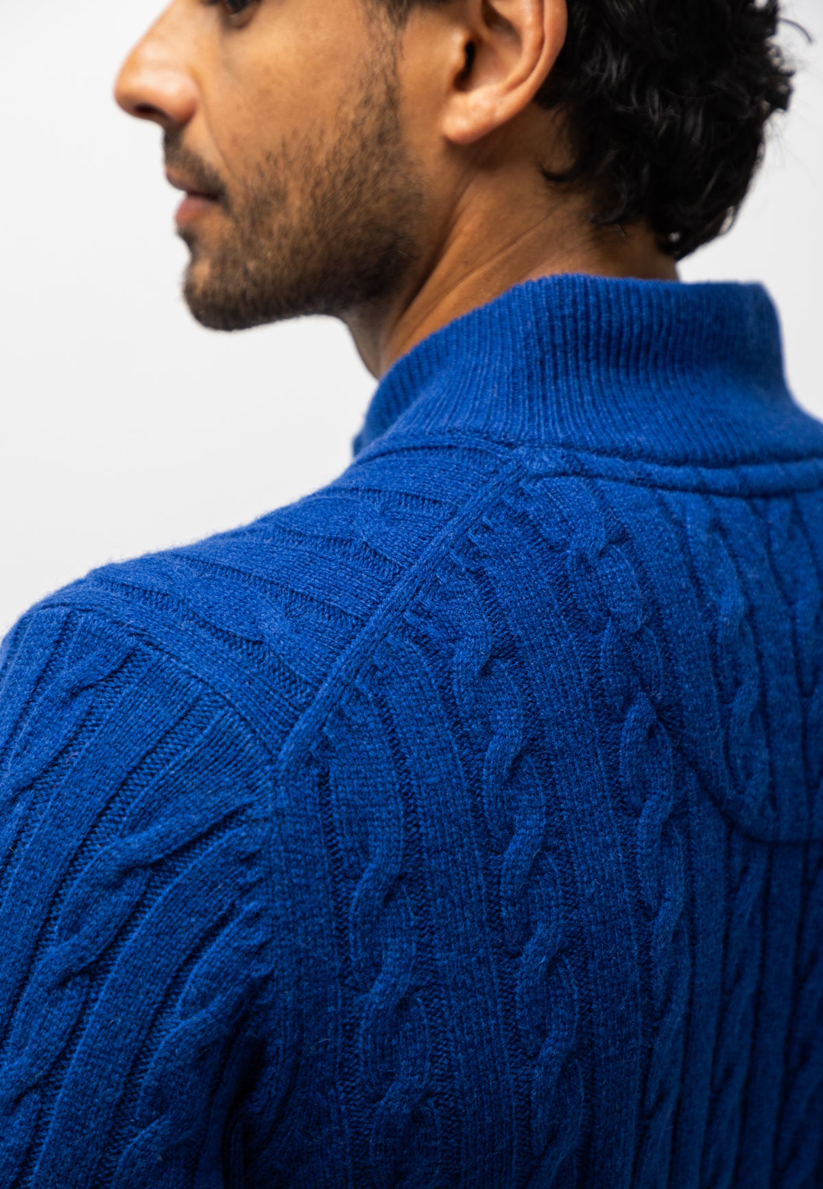 Cable-knit jumper with half zip