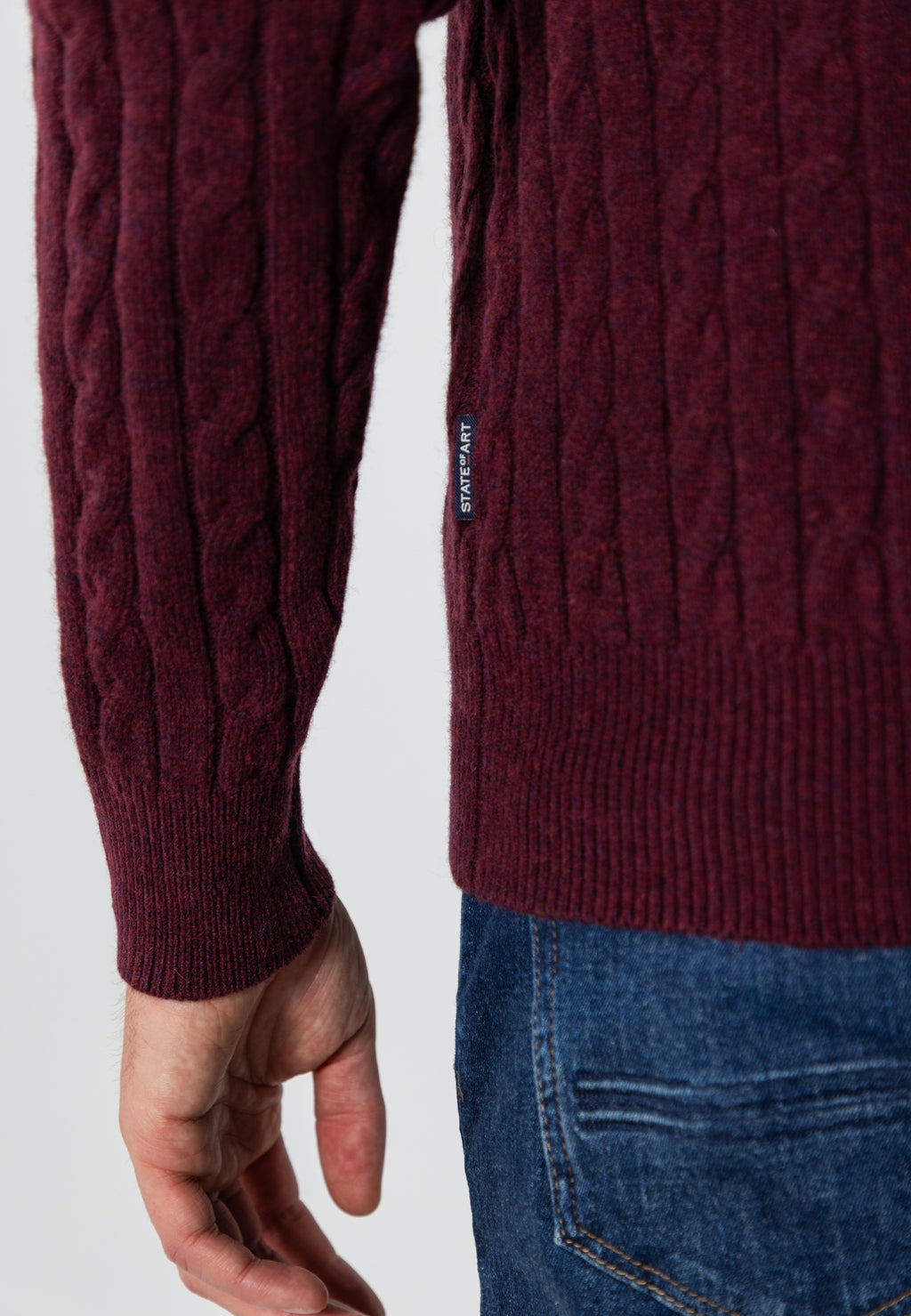 Cable-knit jumper with half zip
