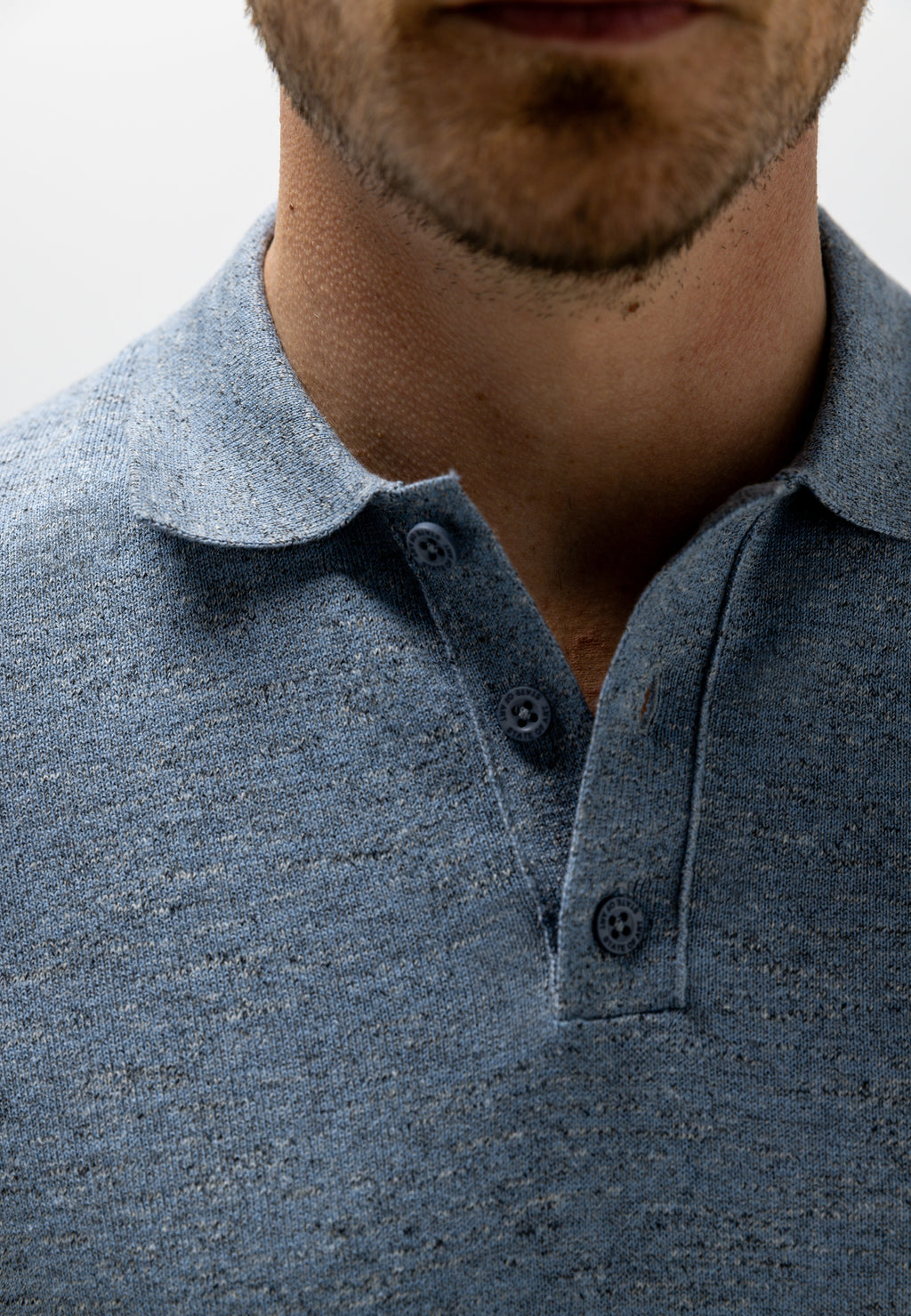 Gebreide polo met gemêleerd effect