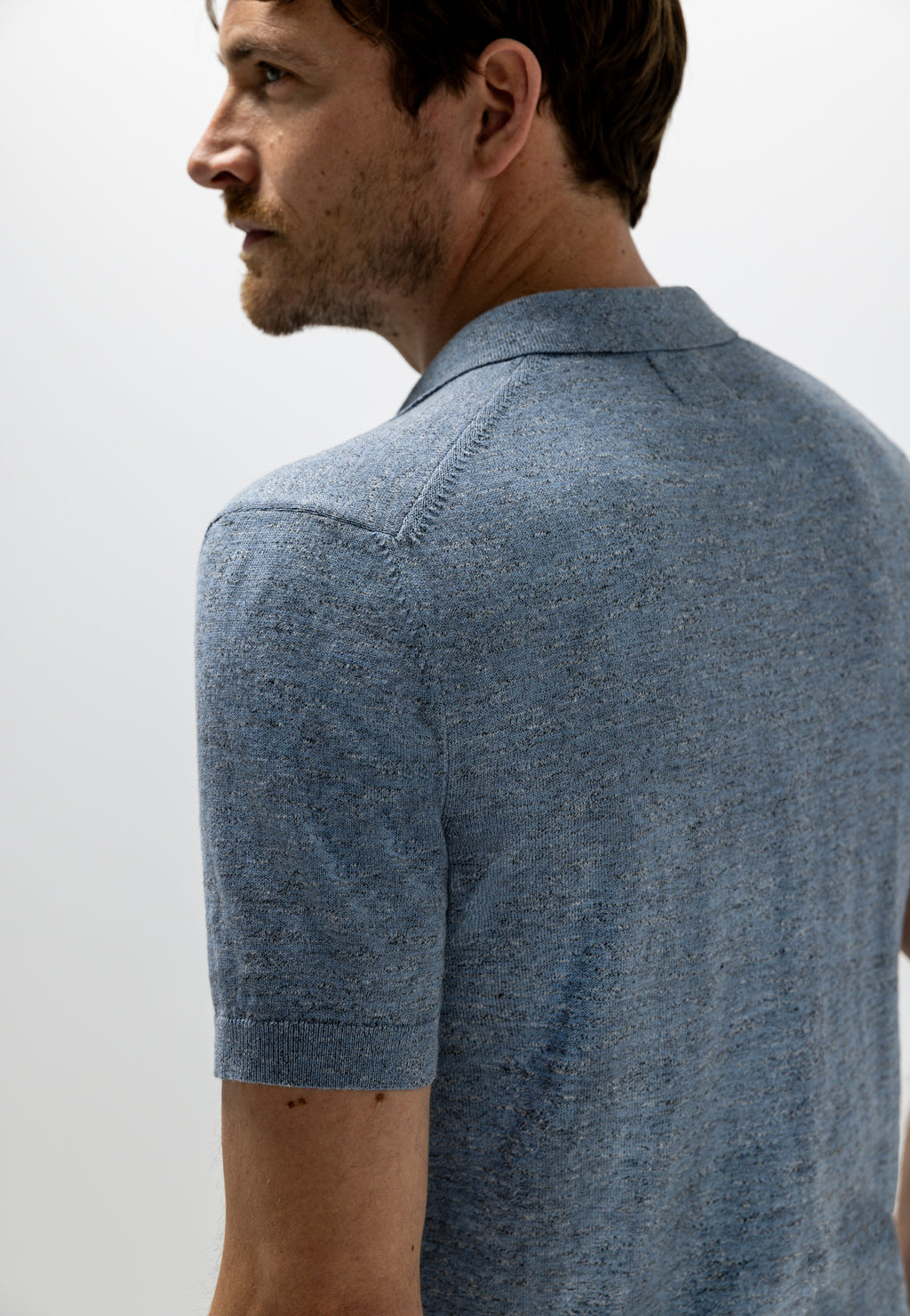 Gebreide polo met gemêleerd effect