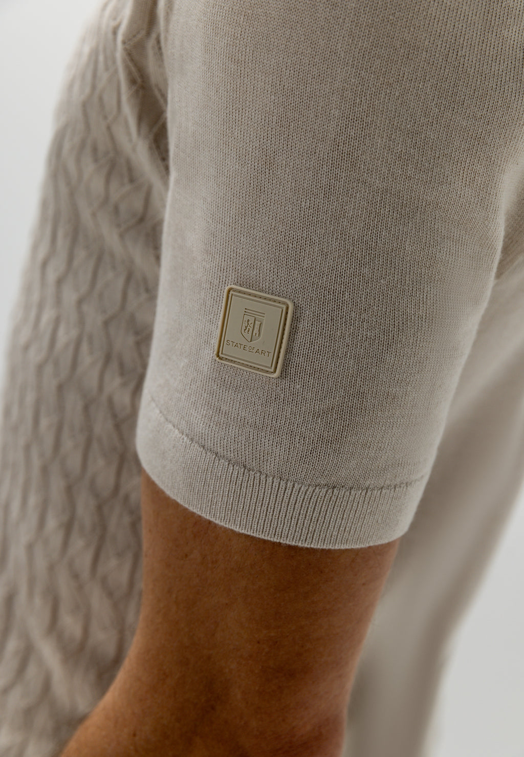 Knitted polo with texture