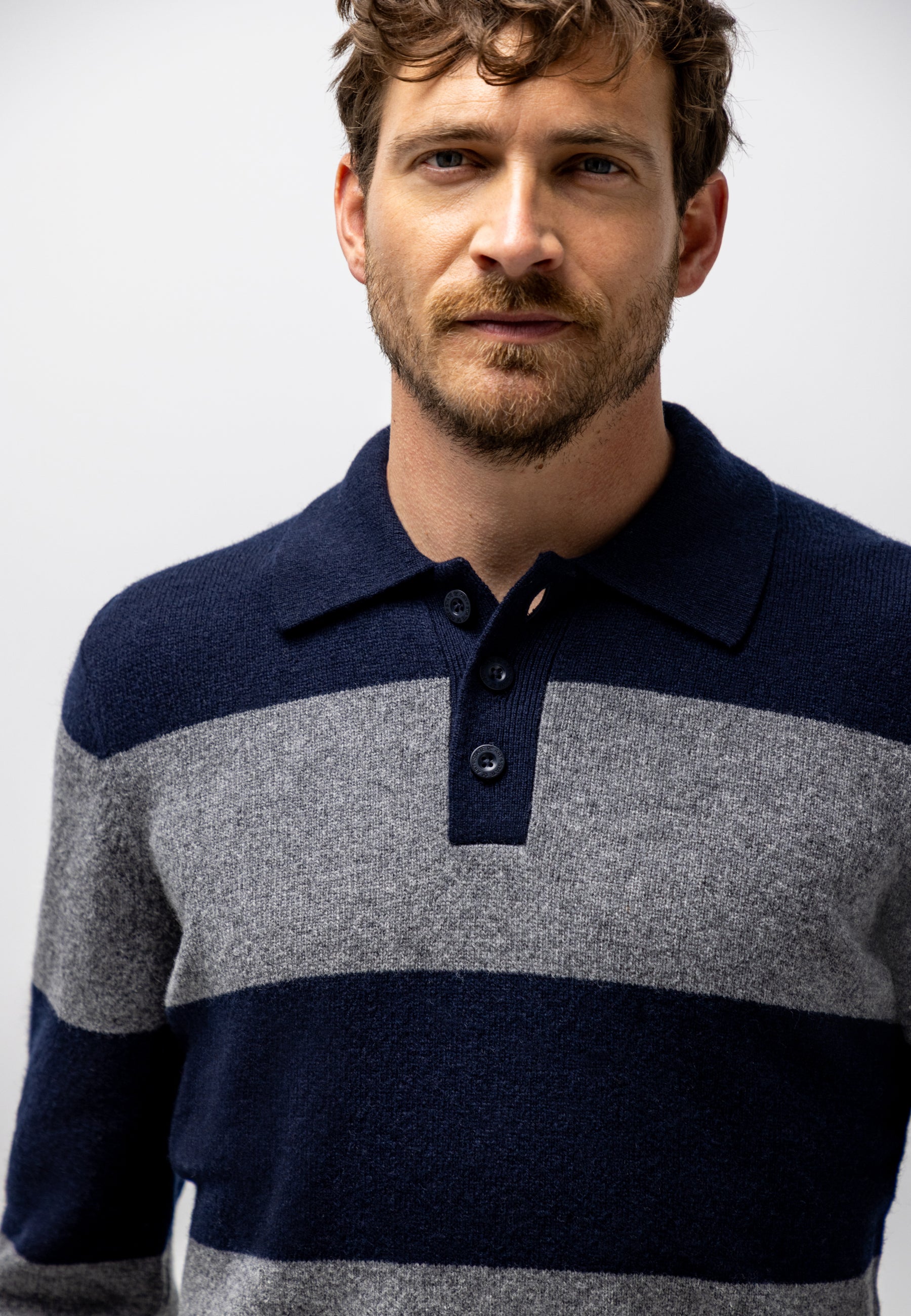 Knitted polo with stripe pattern