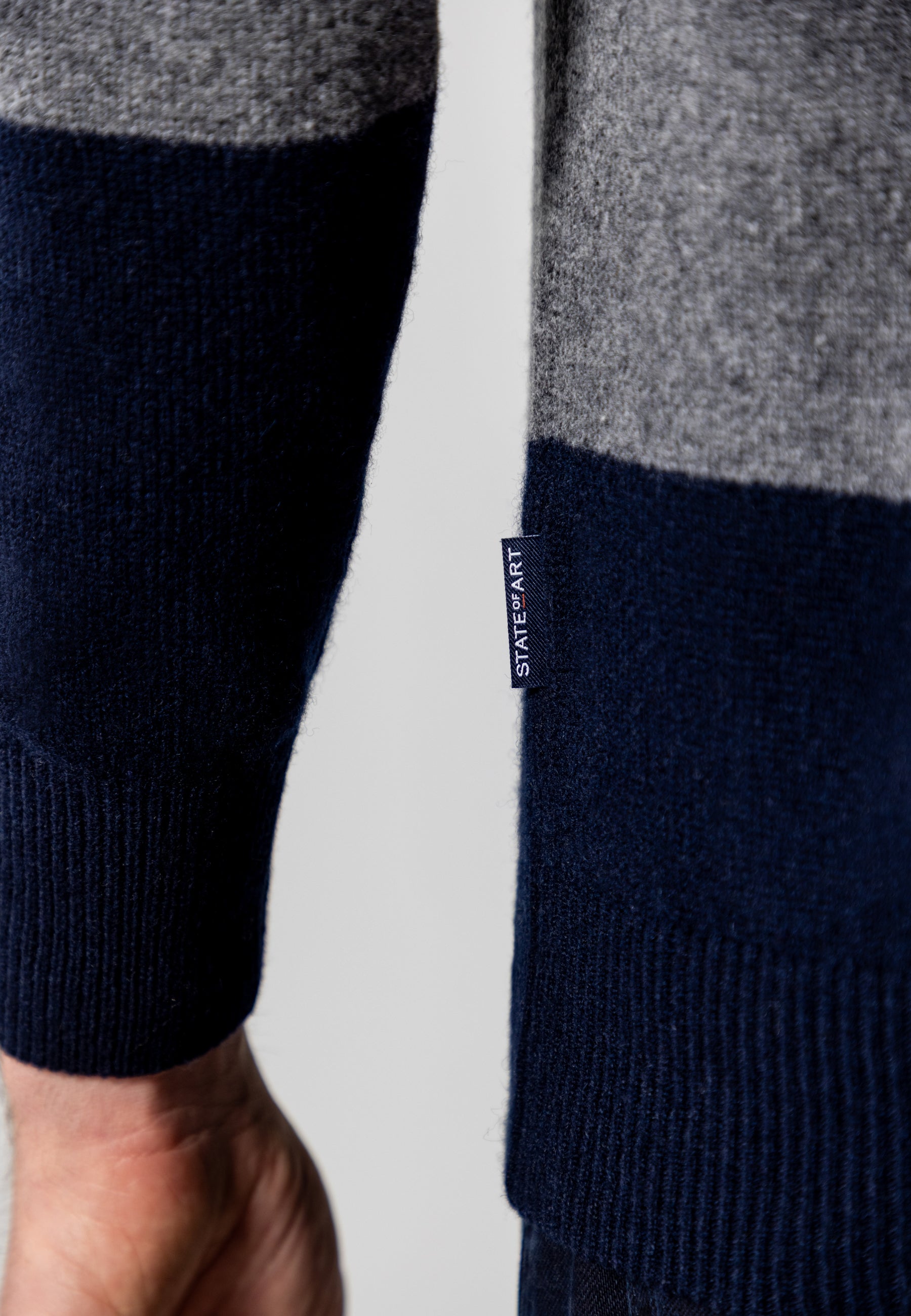 Knitted polo with stripe pattern