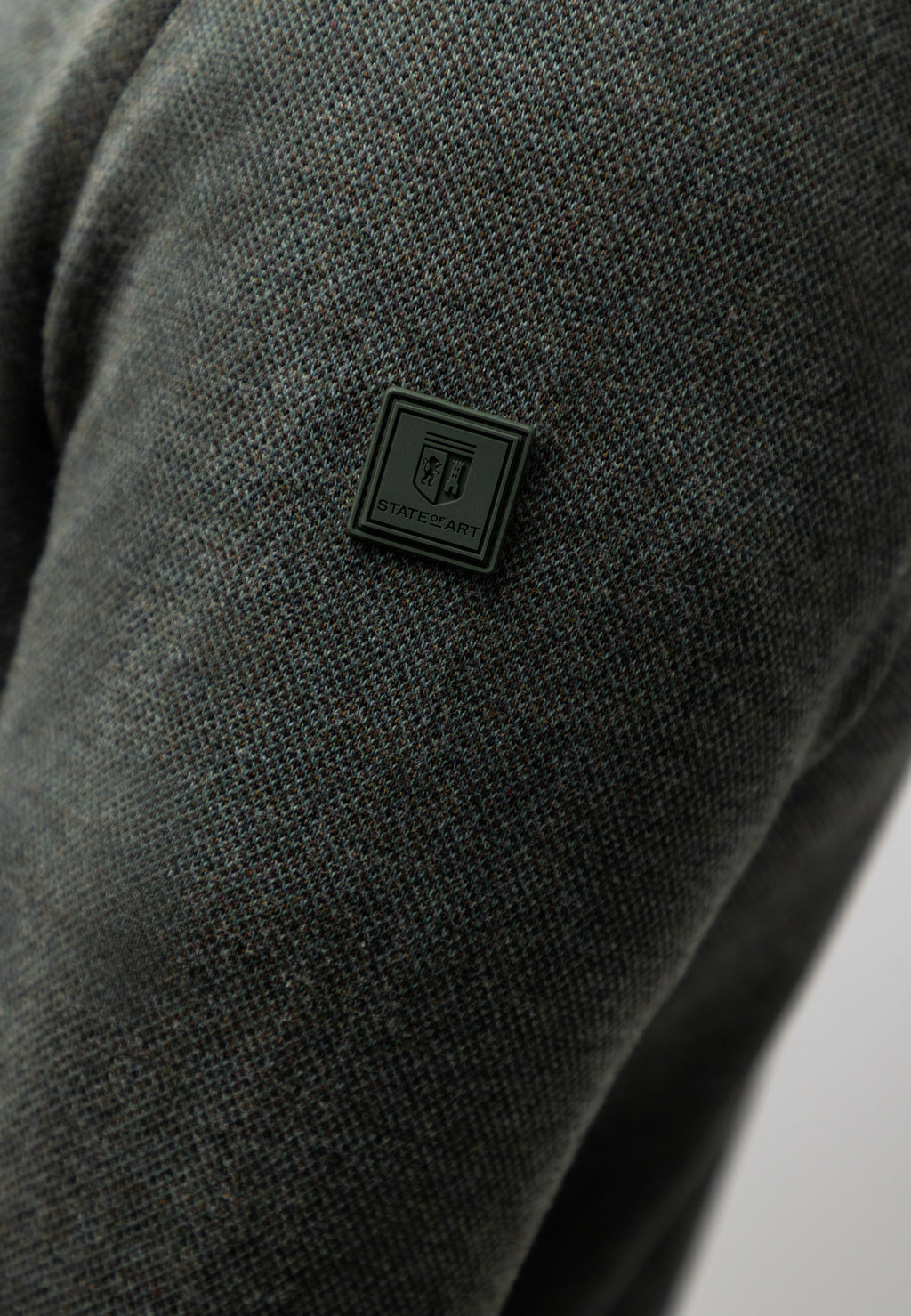 Pull Oxford à badge en caoutchouc