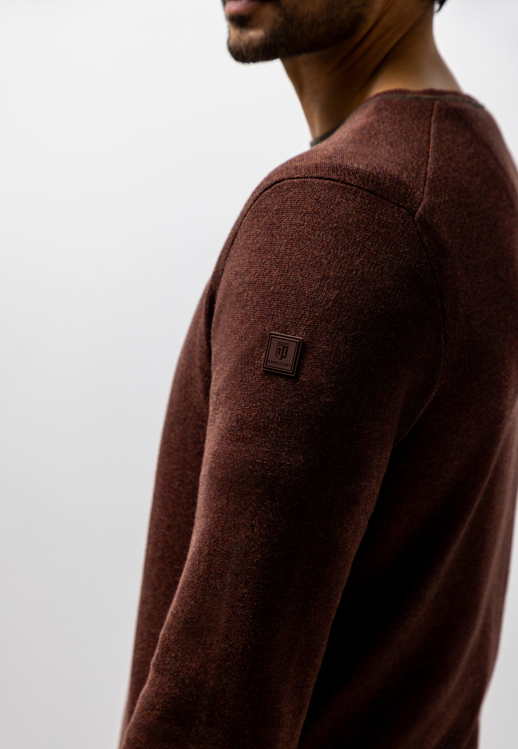Oxford trui met rubberen badge