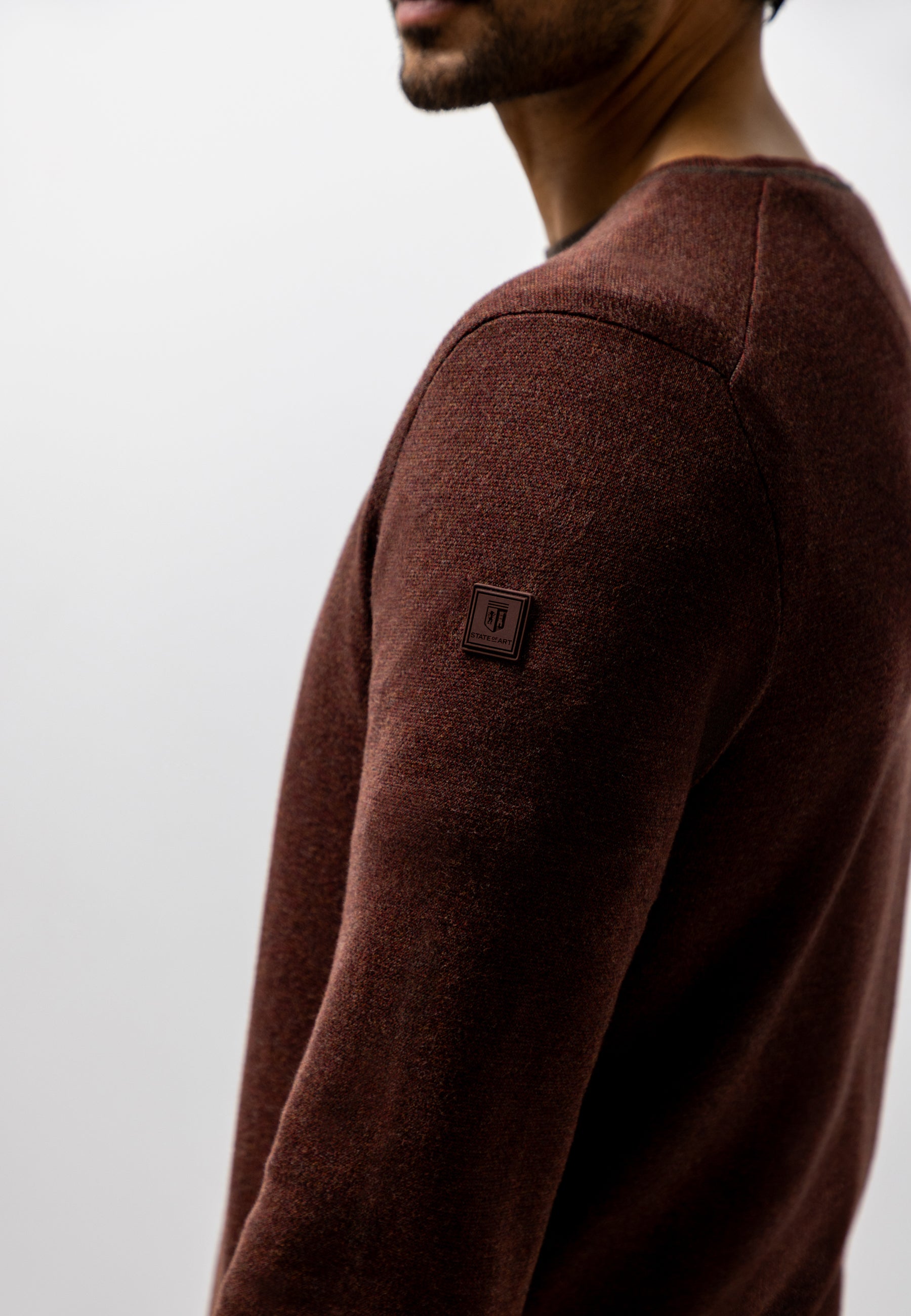 Pull Oxford à badge en caoutchouc