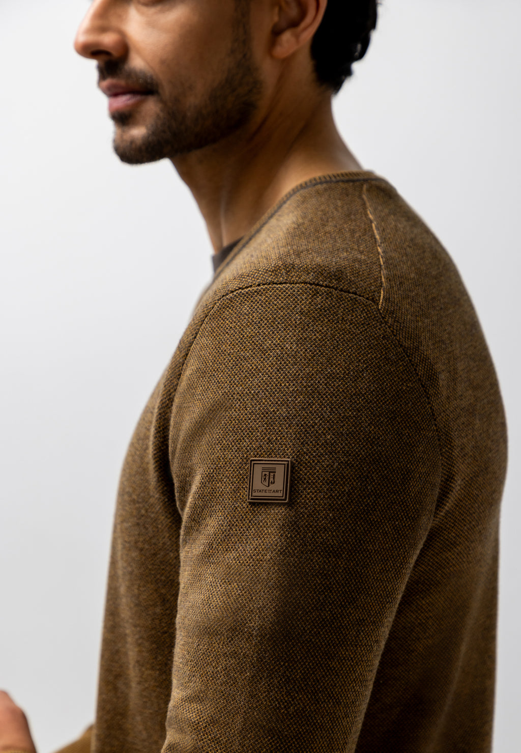 Oxford trui met rubberen badge