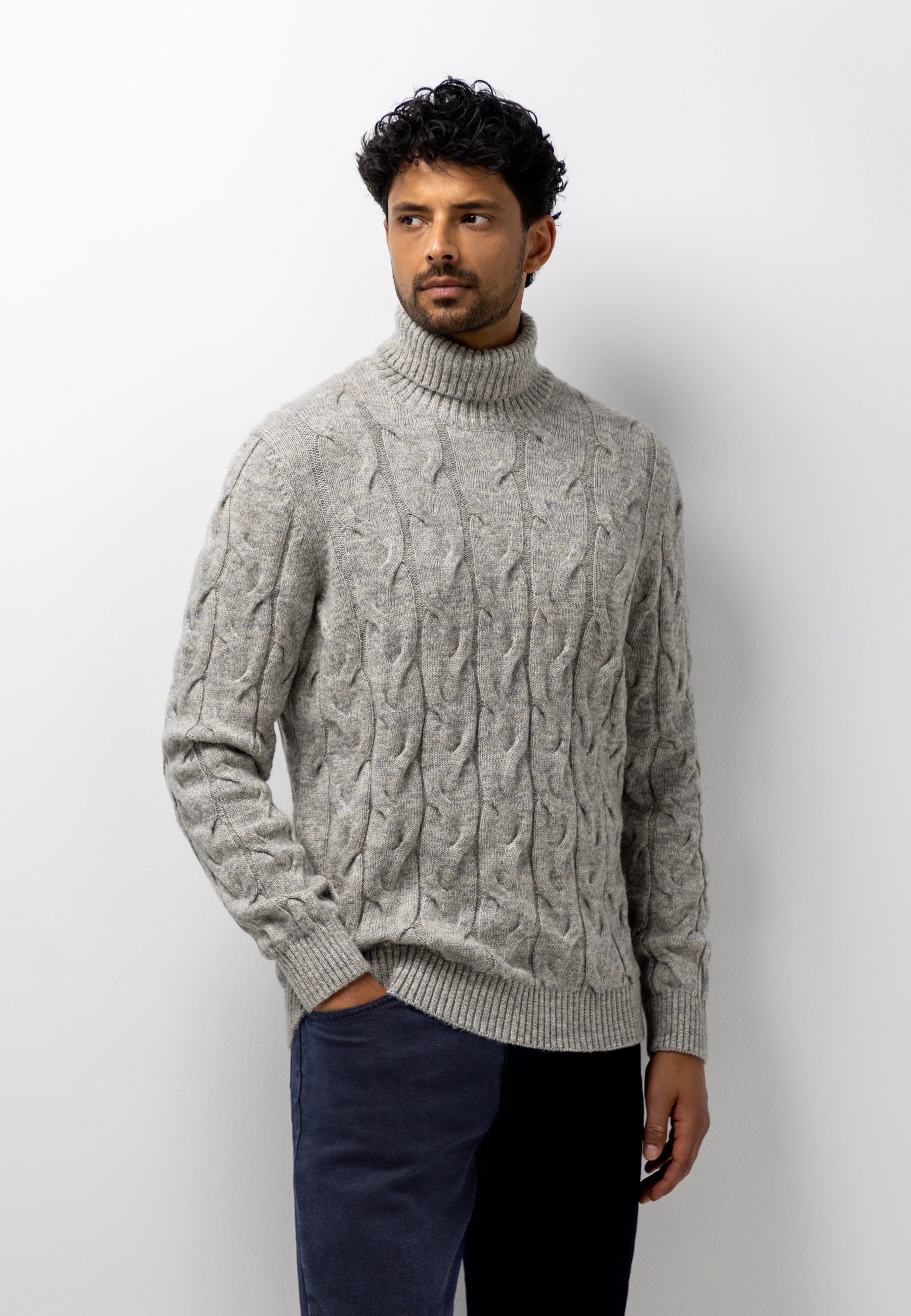 Turtleneck jumper with cable-knit pattern