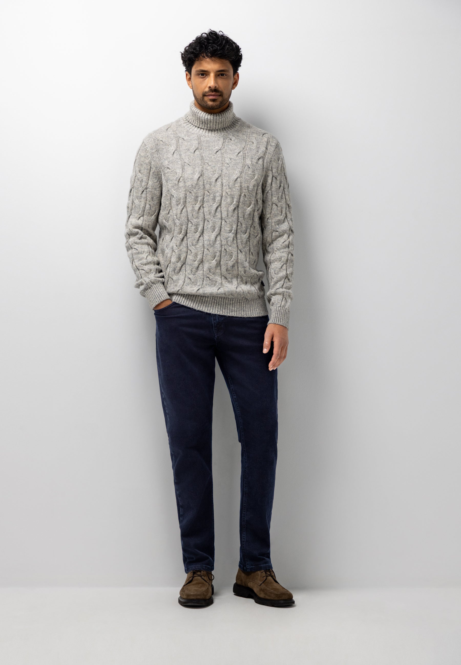 Turtleneck jumper with cable-knit pattern