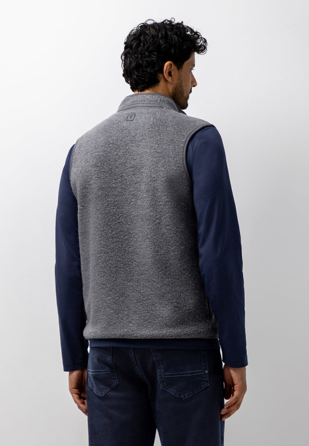 Bodywarmer in teddy fabric