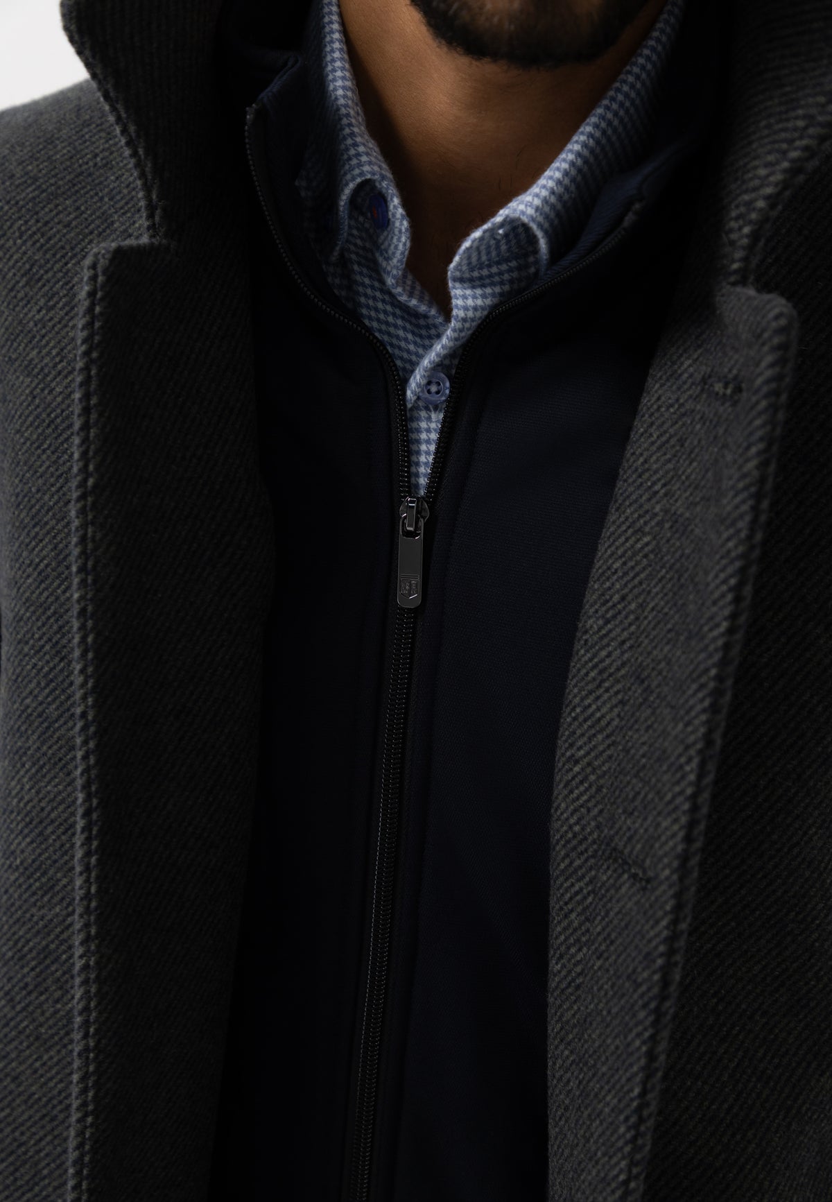 Manteau chiné avec empiècement zippé