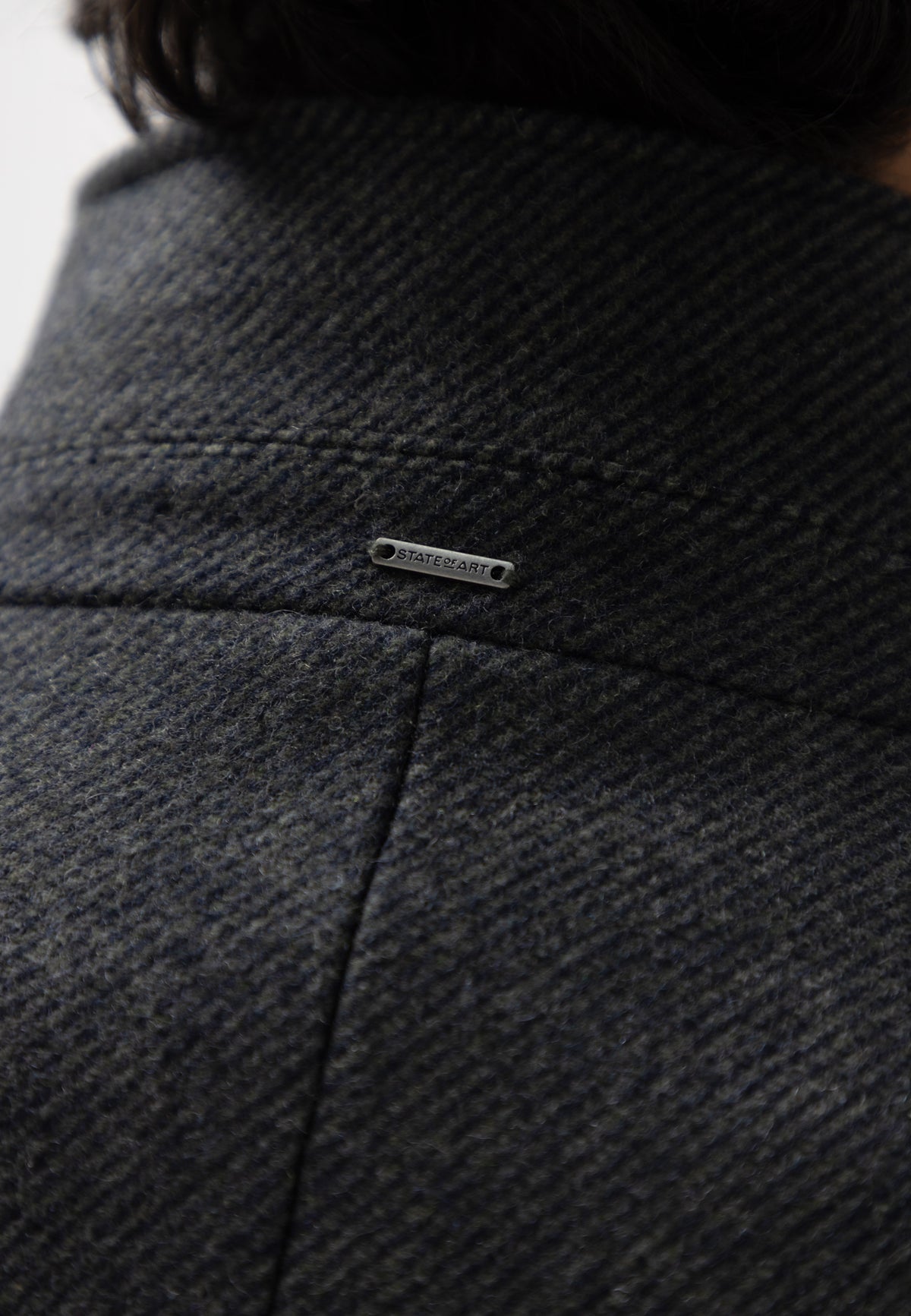 Manteau chiné avec empiècement zippé