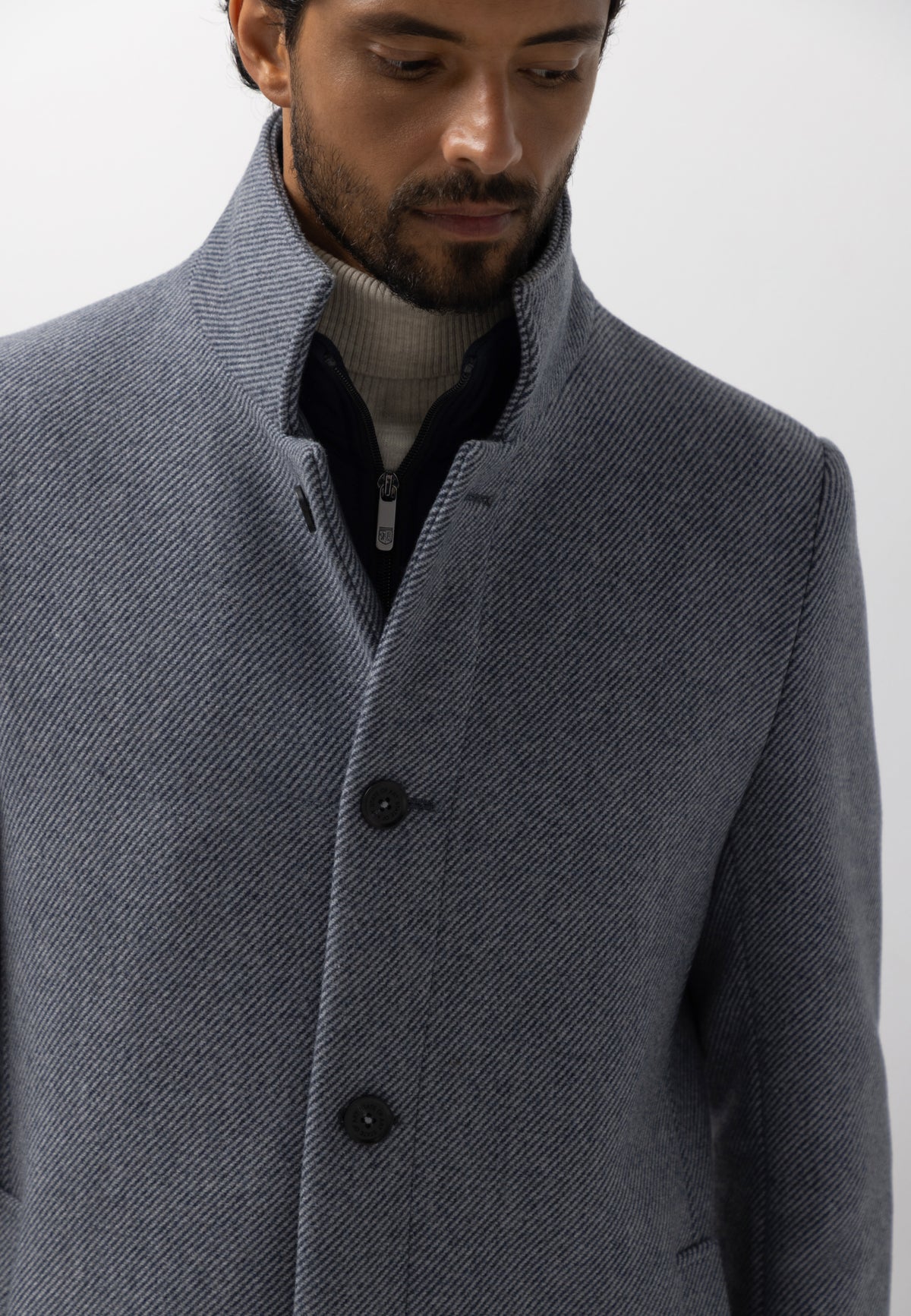 Manteau chiné avec empiècement zippé