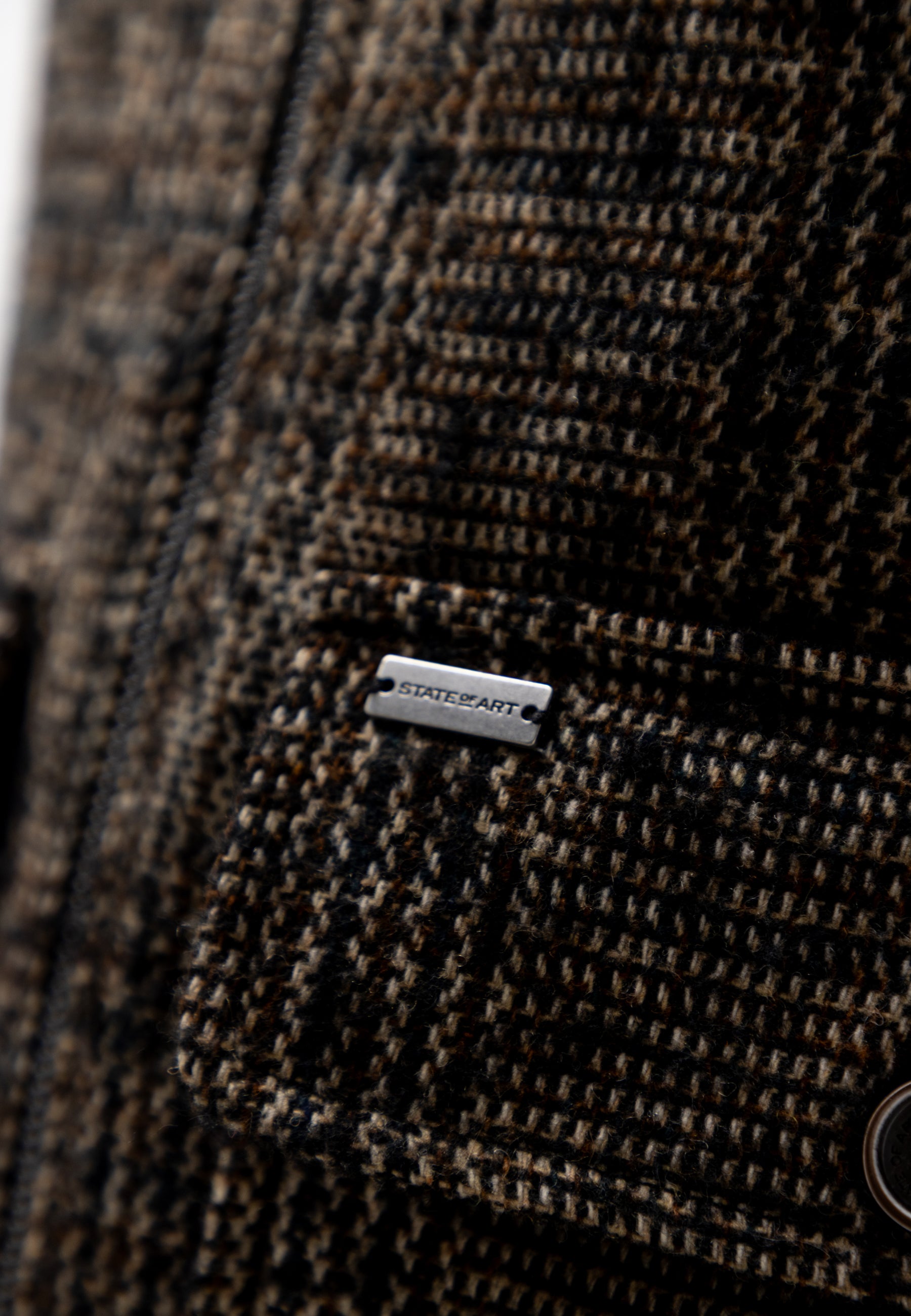 Checked jacket with large flap pockets